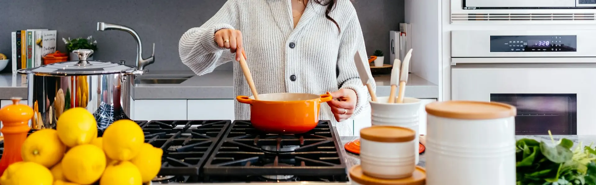 woman cooking inside kitchen room